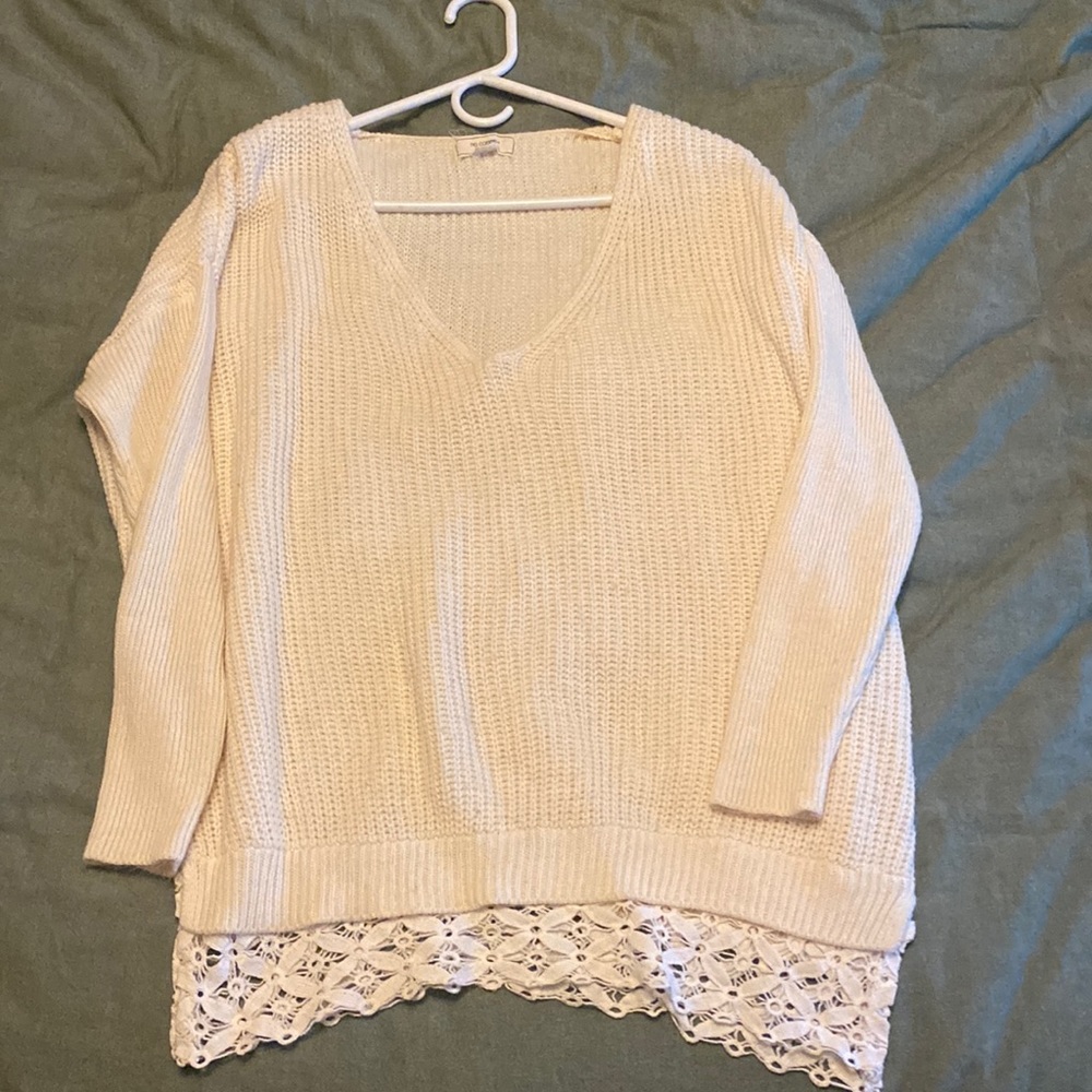 Cream sweater medium brand is NY.LA